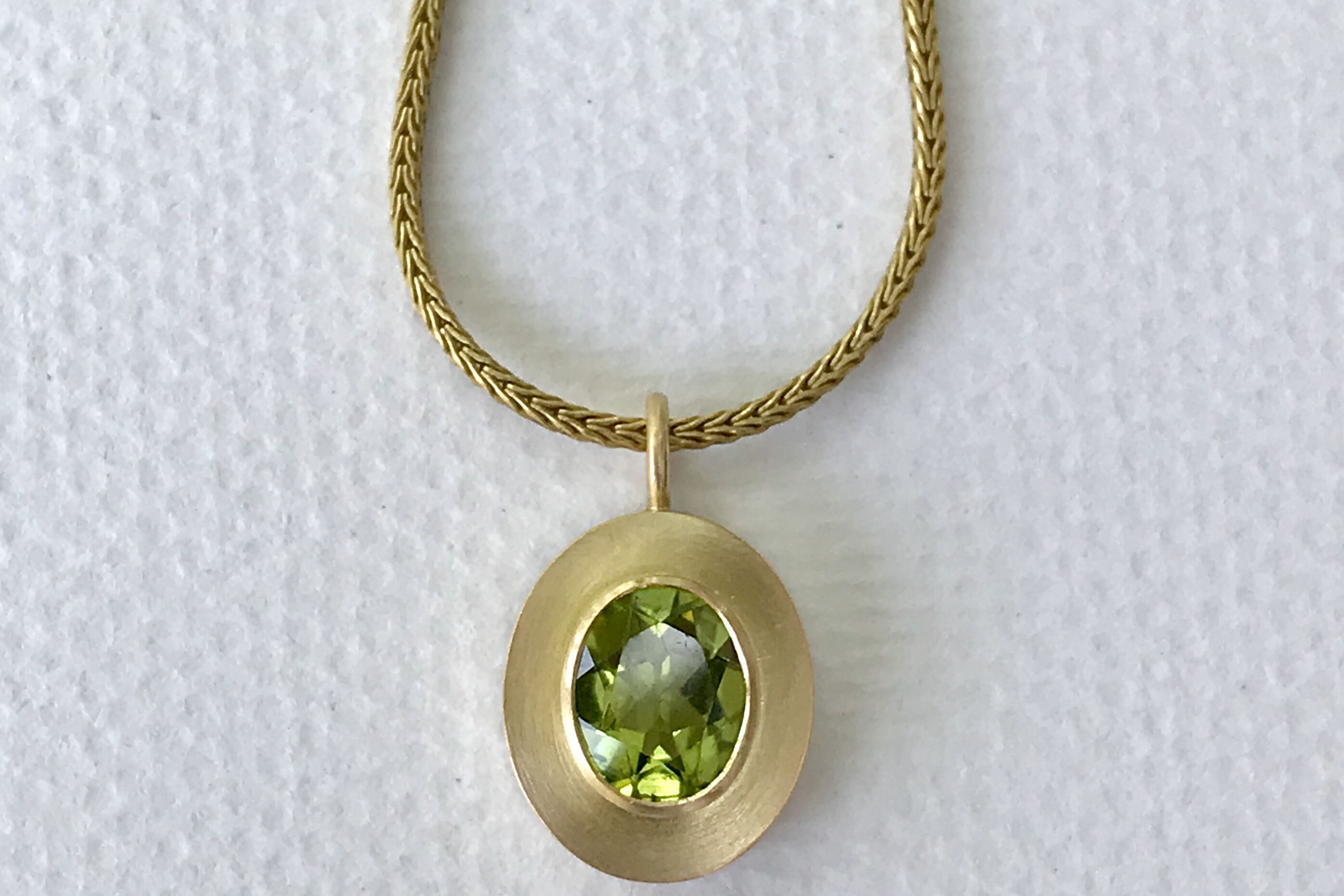 Peridot 18ct gold pendant 